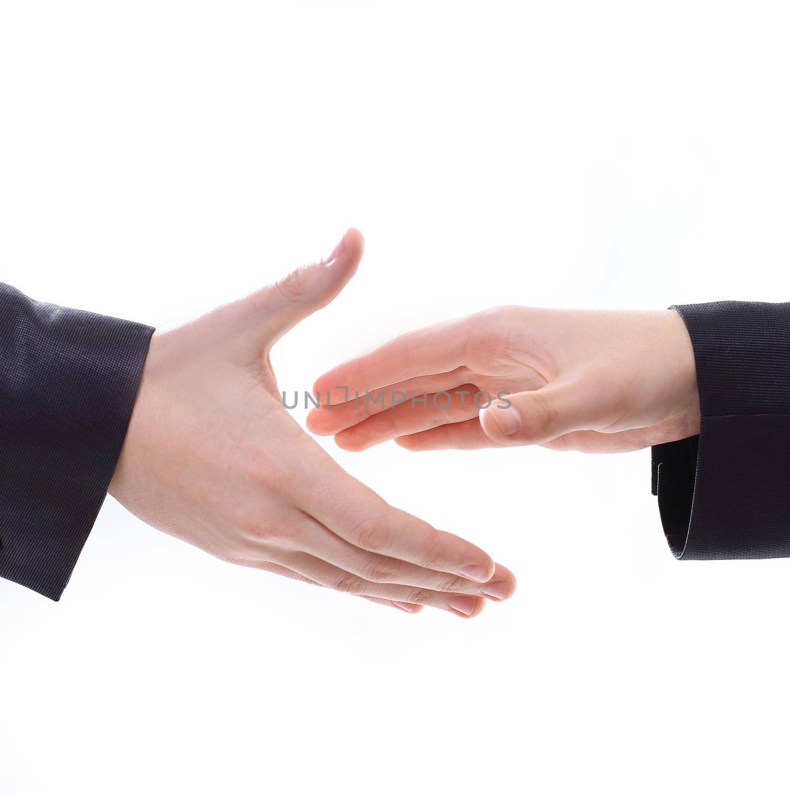 business people stretching out their hands for a handshake by SmartPhotoLab