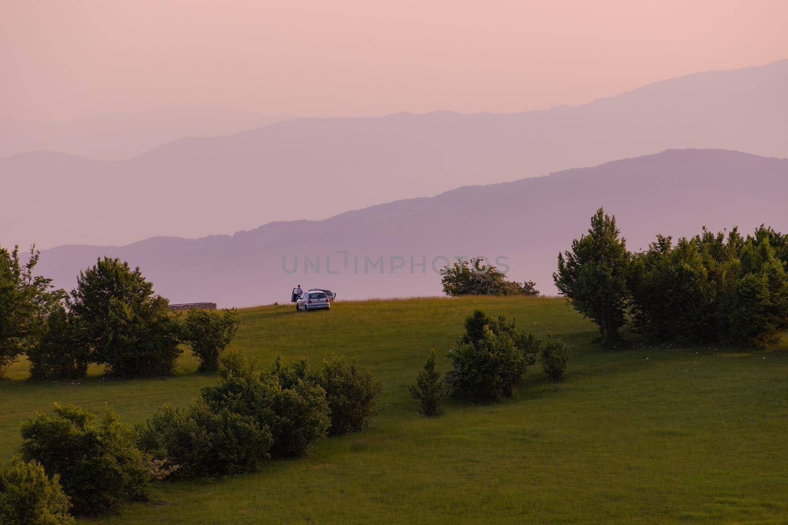 landscape of  summer nature in sunset in mountains and hills on countryside abstract lines and curves background