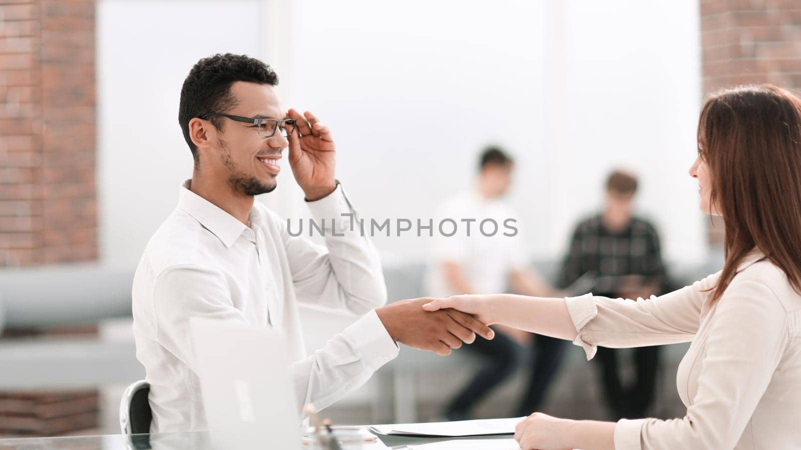 handshake of business people after signing the contract . photo with copy space