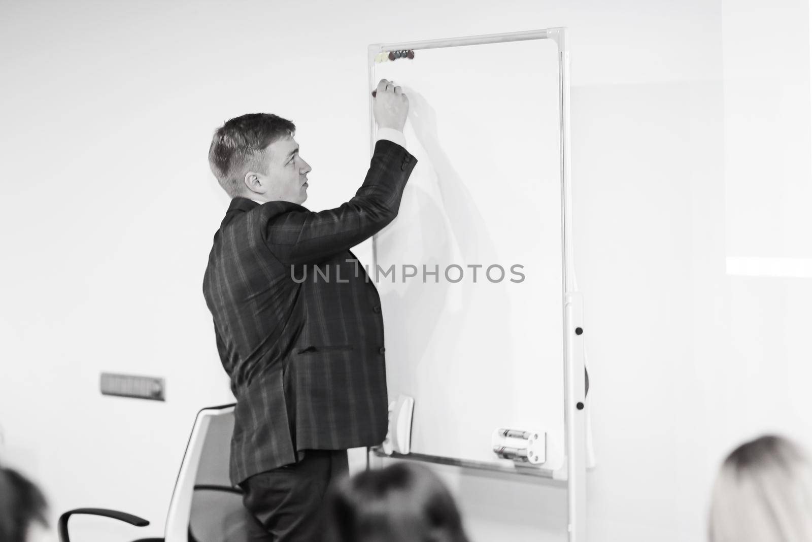 Young Businessman Giving Speech In The Conference.photo with place for text