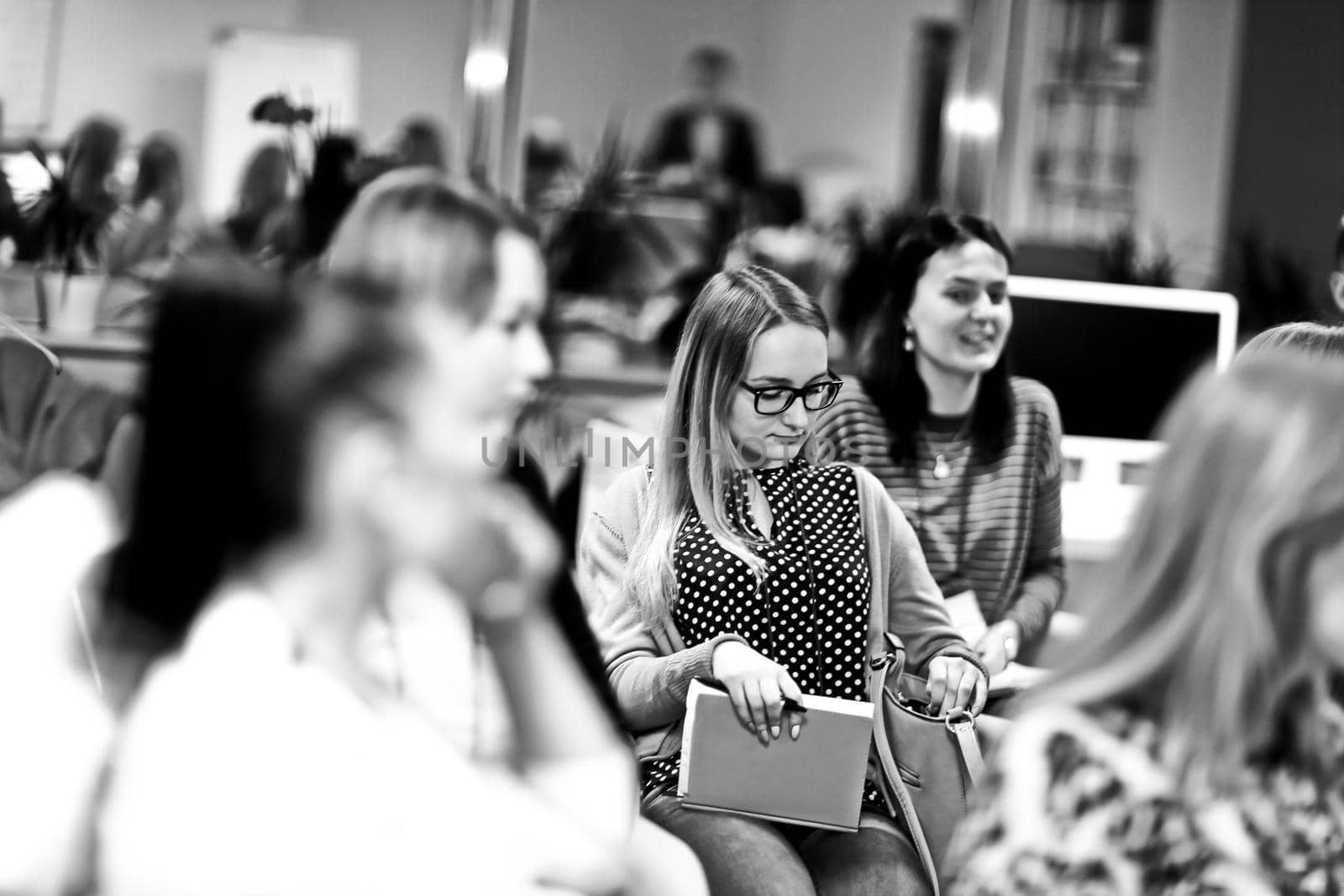 close up.a group of women listening to a lecture at a business seminar