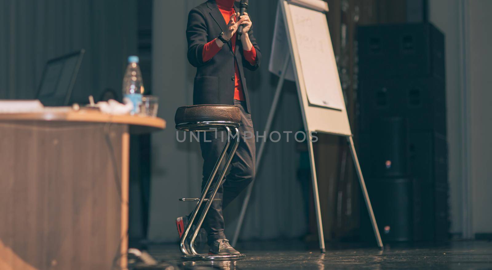 cropped image .lecturer, making a report in the conference room. business and education