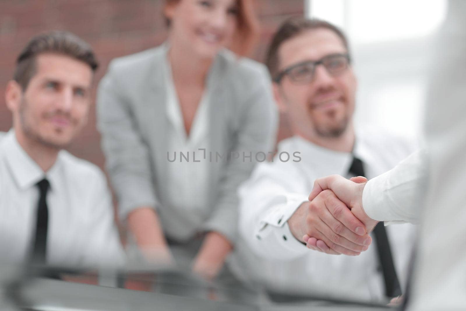 close up. handshake business partners.business background
