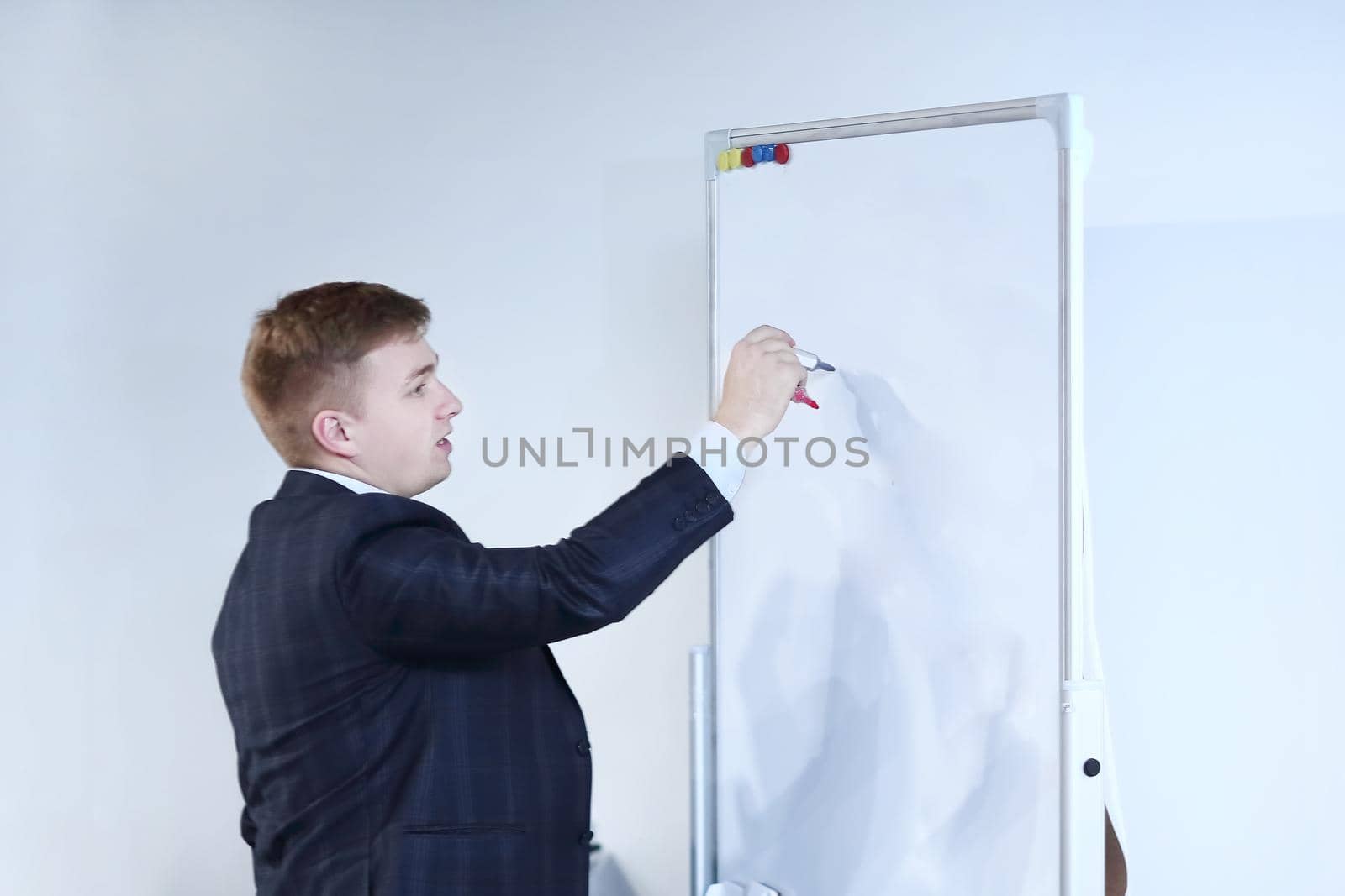 close up.businessman writes a marker on the Board.photo with copy space