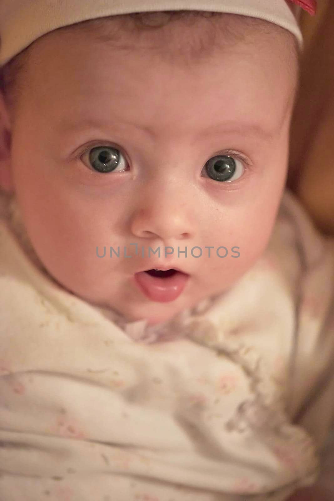 portrait happy cute newborn little baby smilling  at home