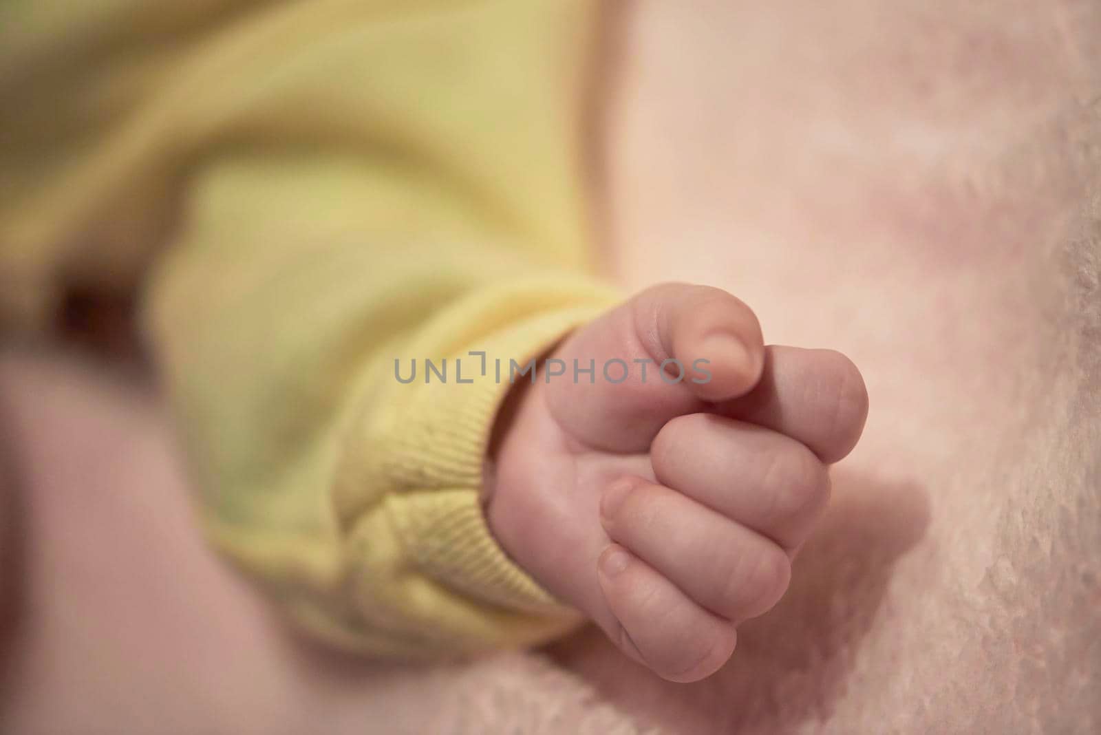 cute  little newborn baby smilling  at home