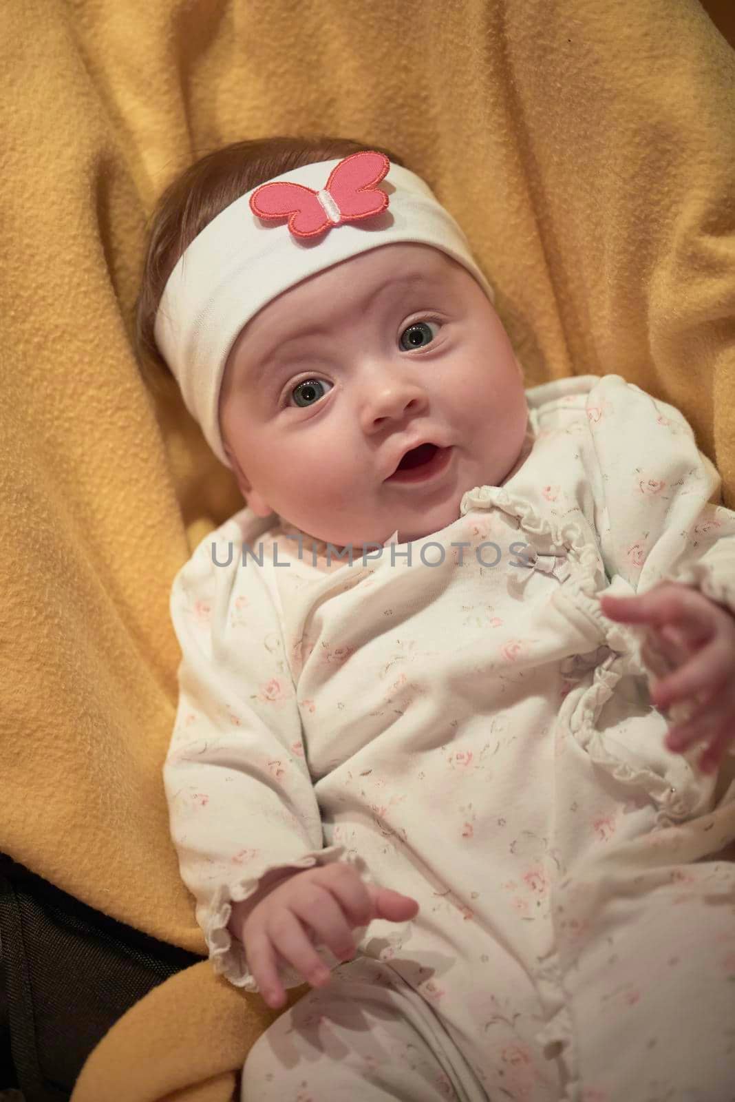 portrait happy cute newborn little baby smilling  at home