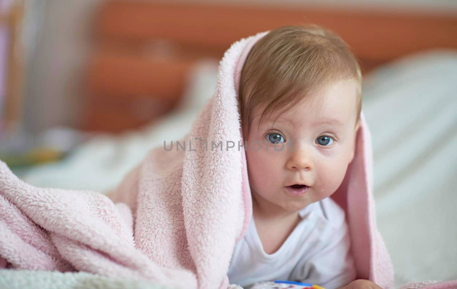 cute  little newborn baby smilling  at home