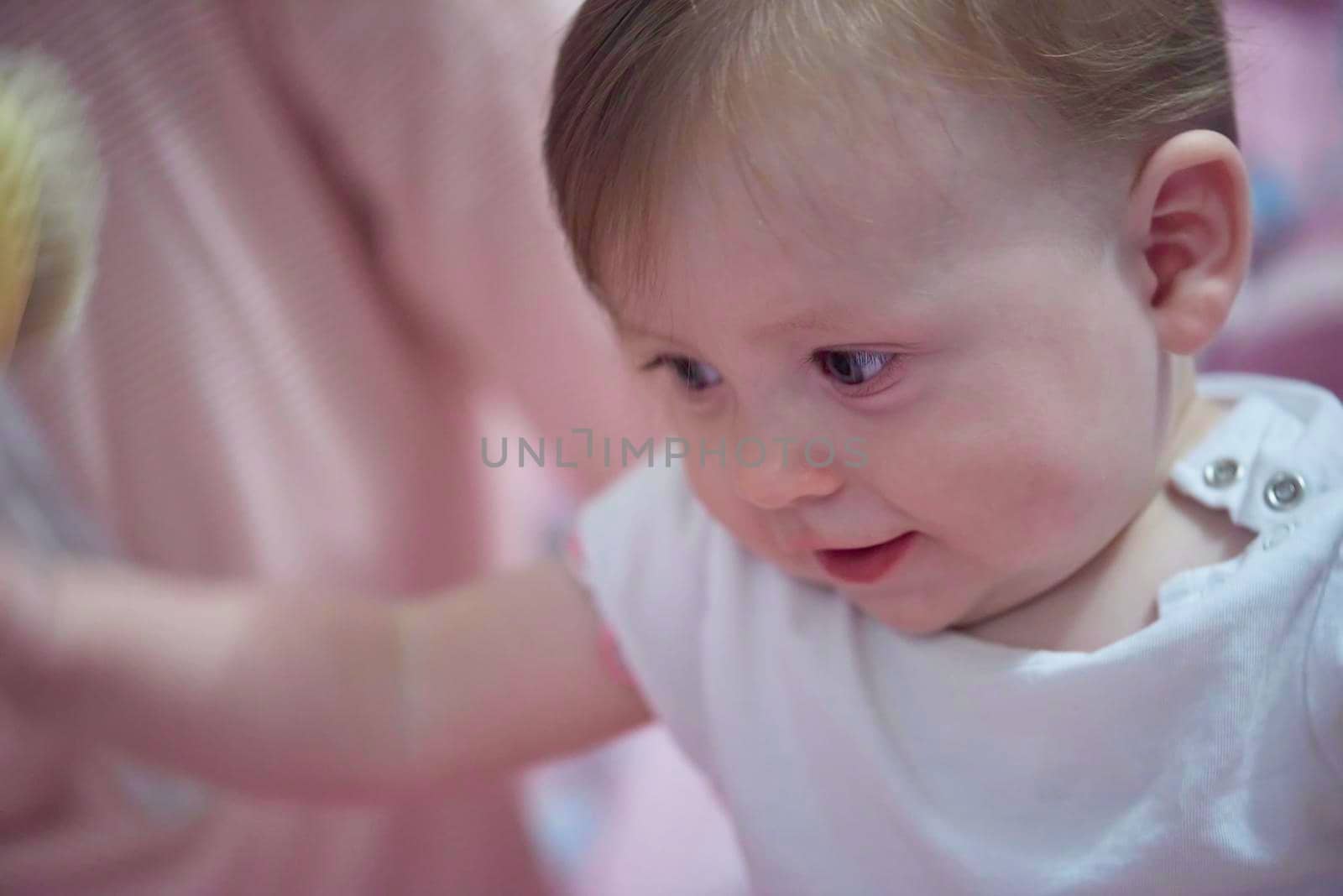 cute  little  newborn baby smilling by dotshock
