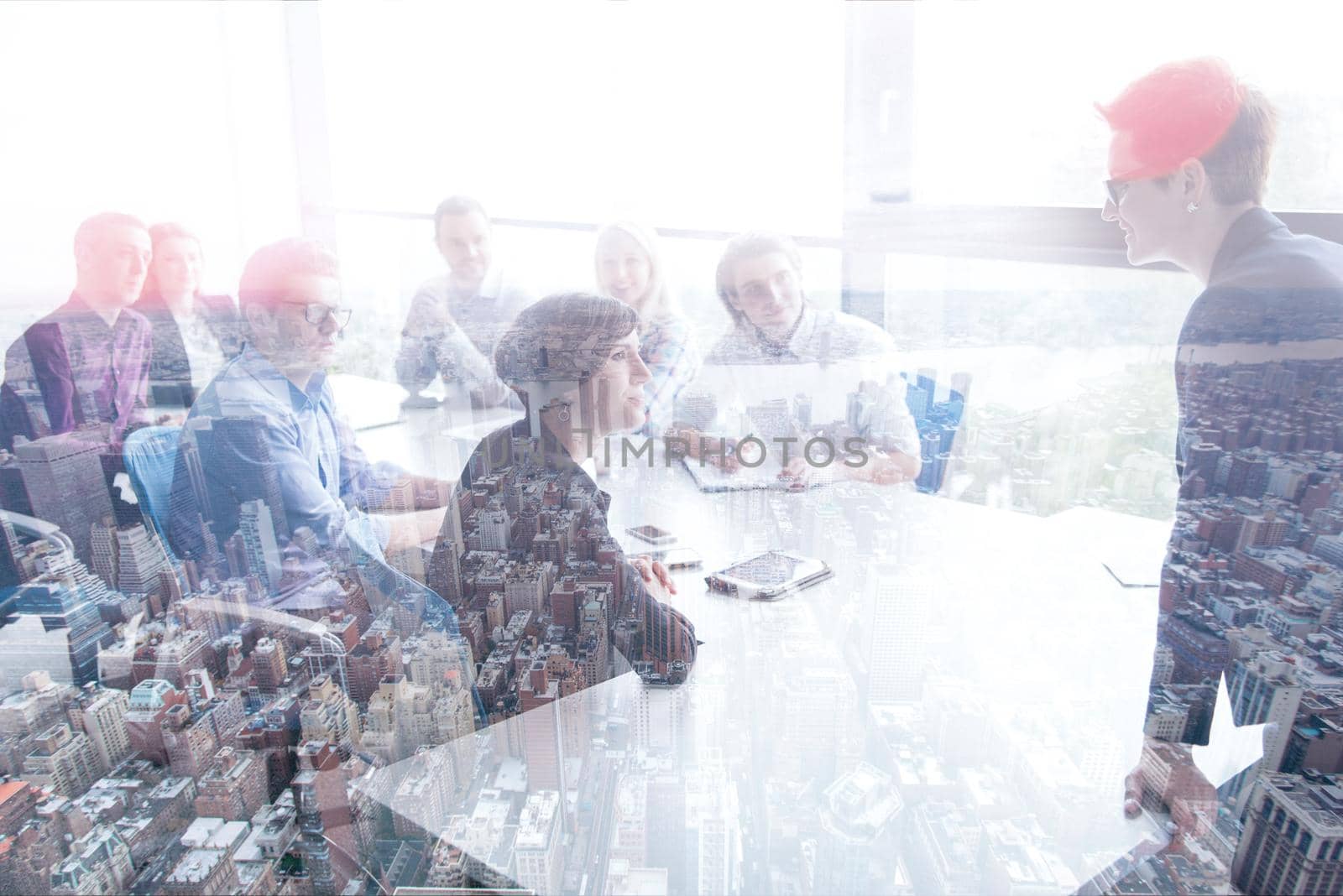 Group of young people meeting in startup office by dotshock