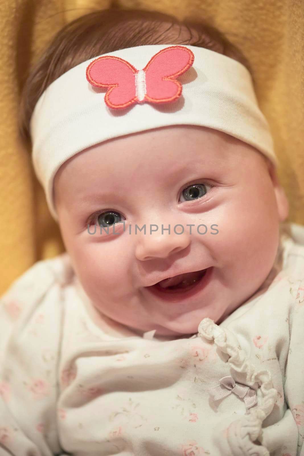 portrait happy cute newborn little baby smilling  at home