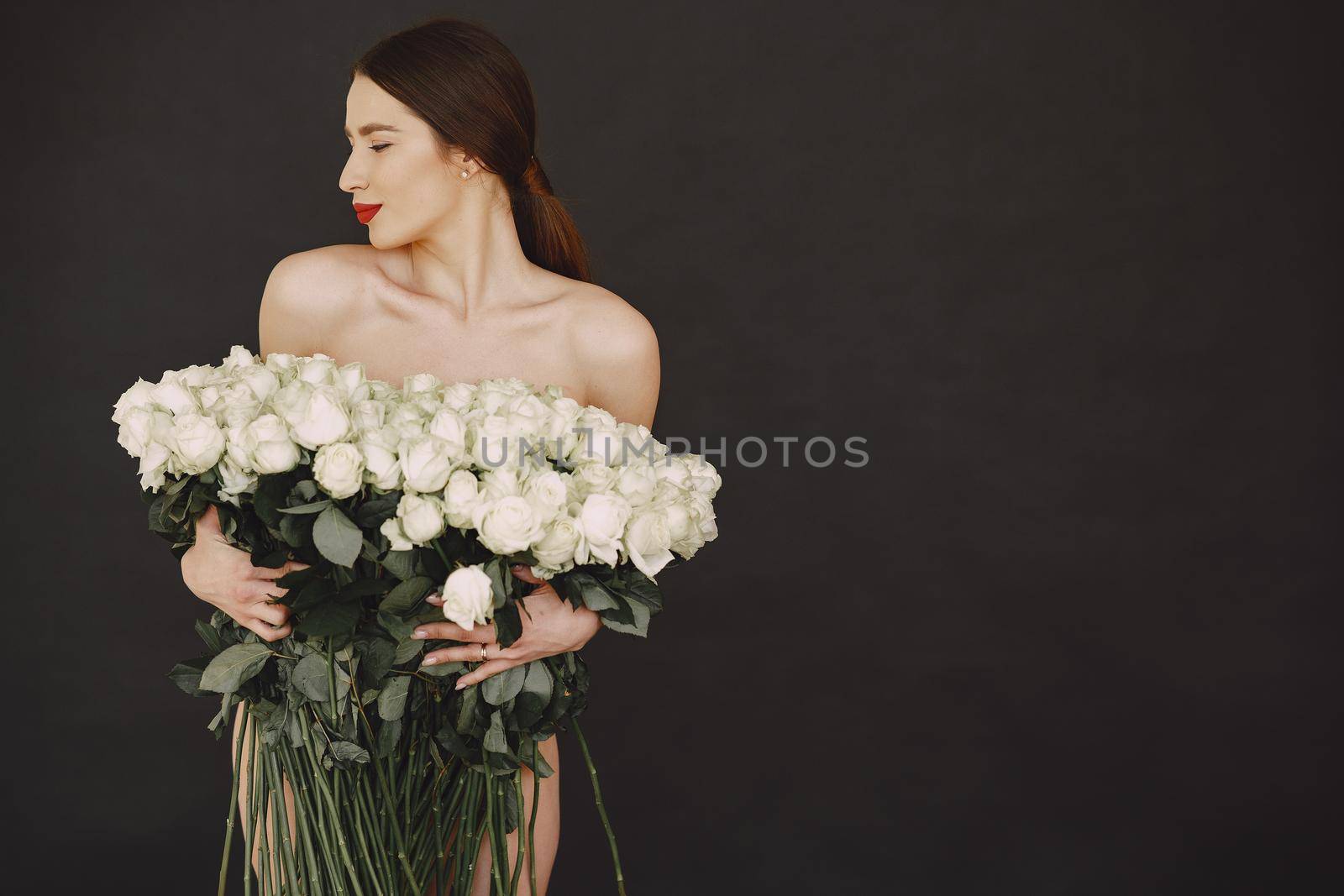 Fashion girl posing in a photo studio by prostooleh