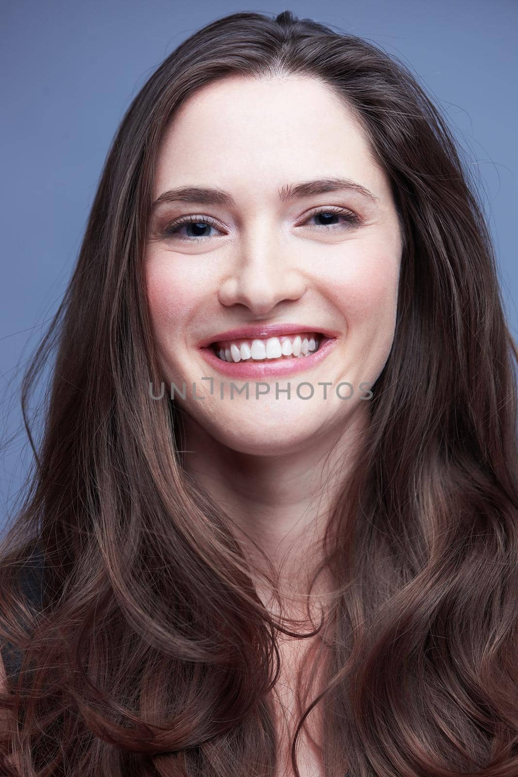 portrait of young woman isolated on white background  in studio