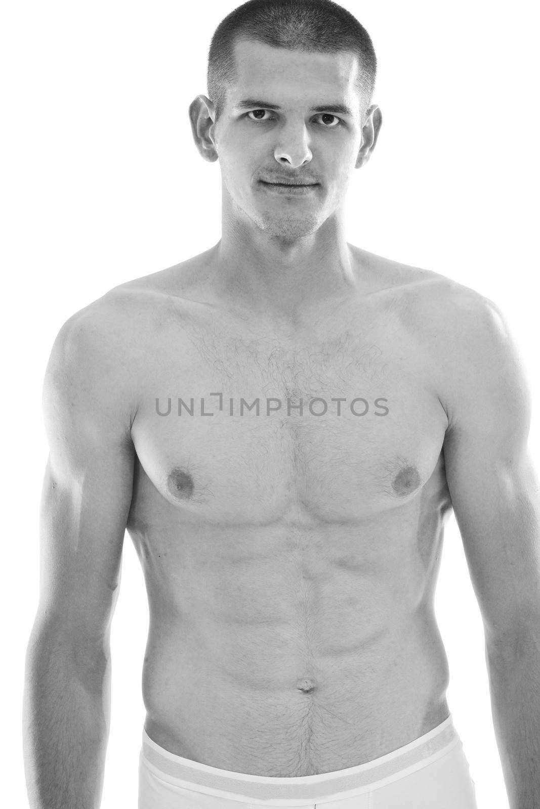 healthy fit young man islated on white background by dotshock