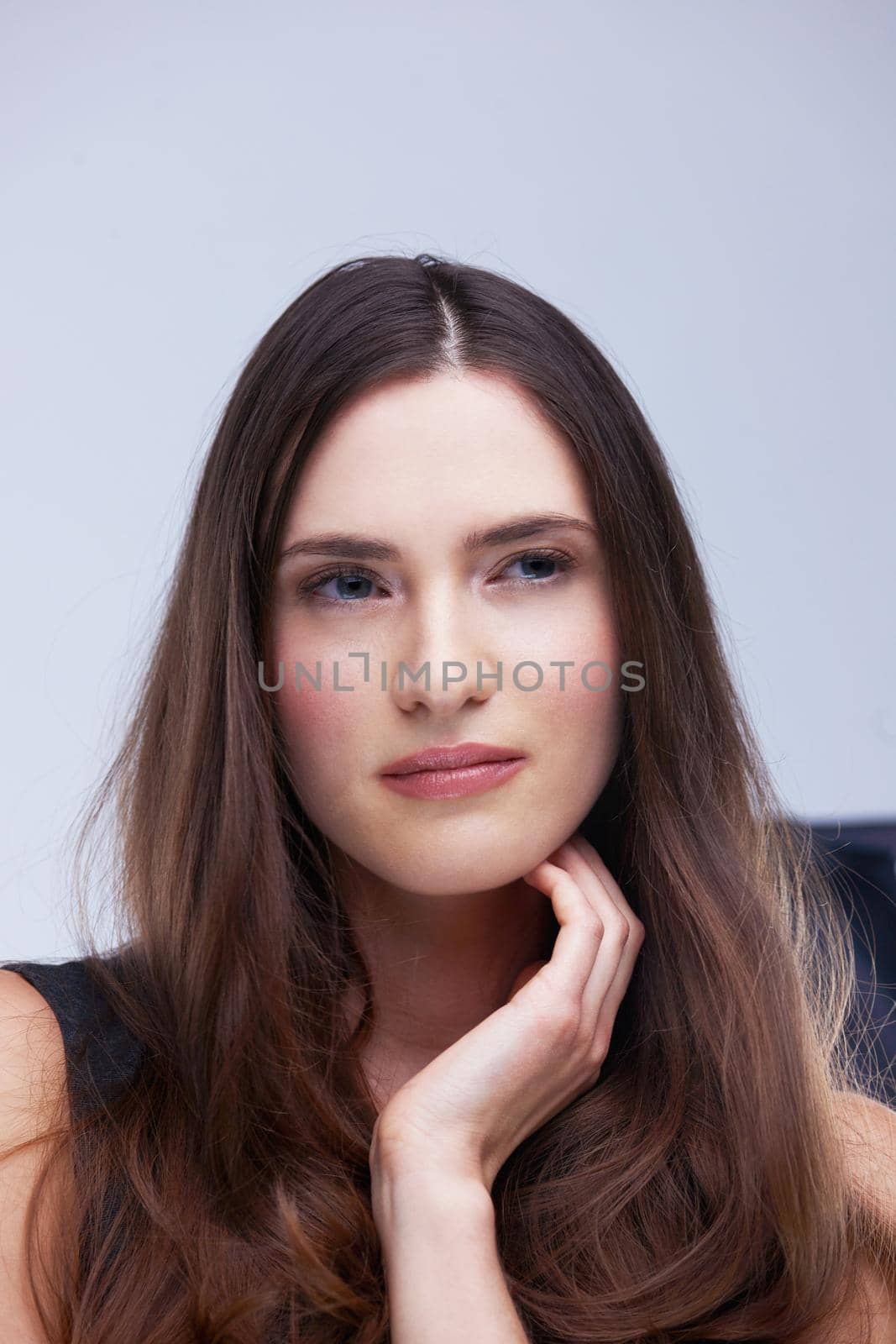 portrait of young woman isolated on white background  in studio