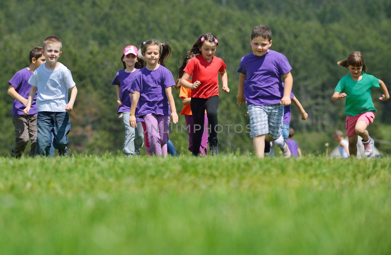 happy kids group  have fun in nature by dotshock