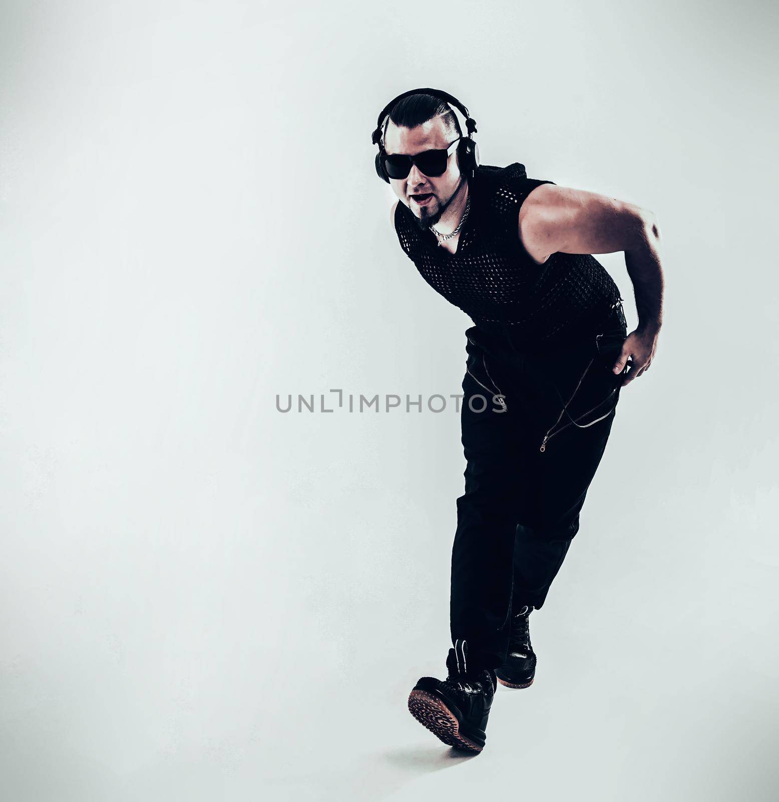 best rapper dancing break dance .photo on a white background. by SmartPhotoLab