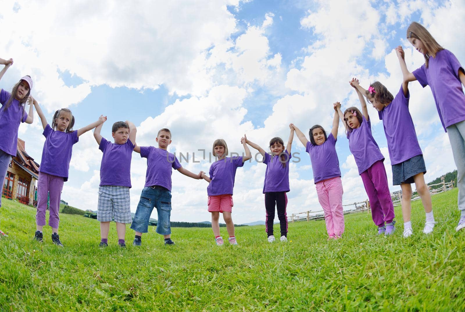 happy kids group have fun in nature outdoors park