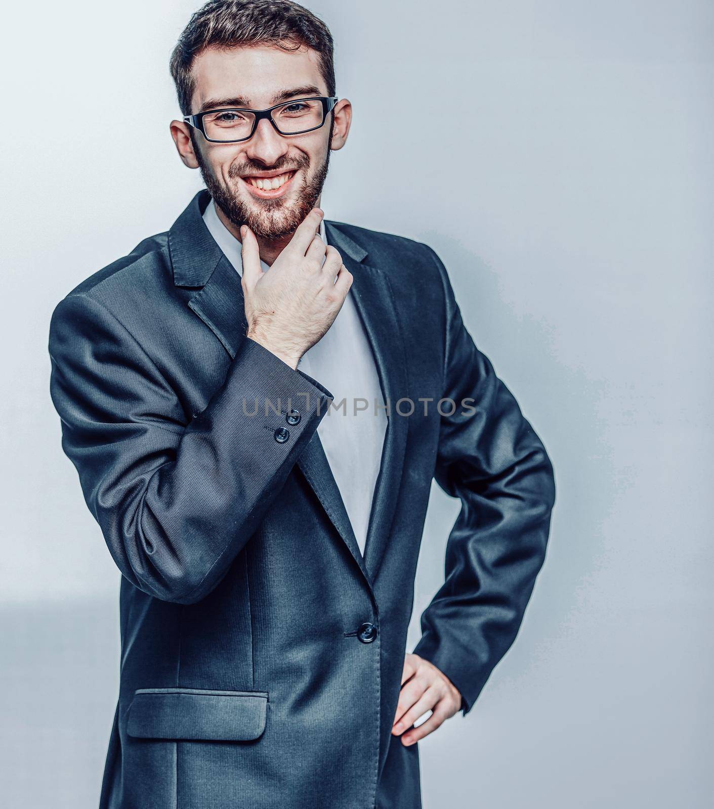 successful lawyer in a business suit on a white background.the photo has a empty space for your text.