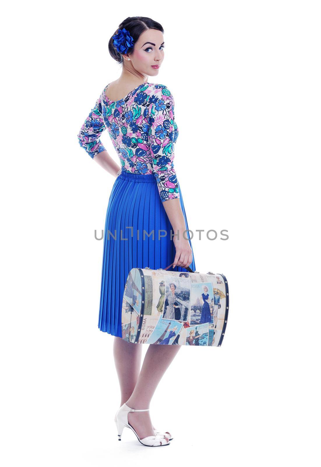 pretty young happy woman with travel bag waiting and posing isolated on white backround  in studio