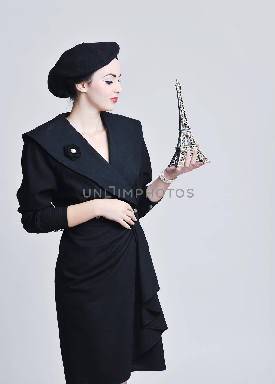 beautiful young woman with paris symbol eiffel tower by dotshock