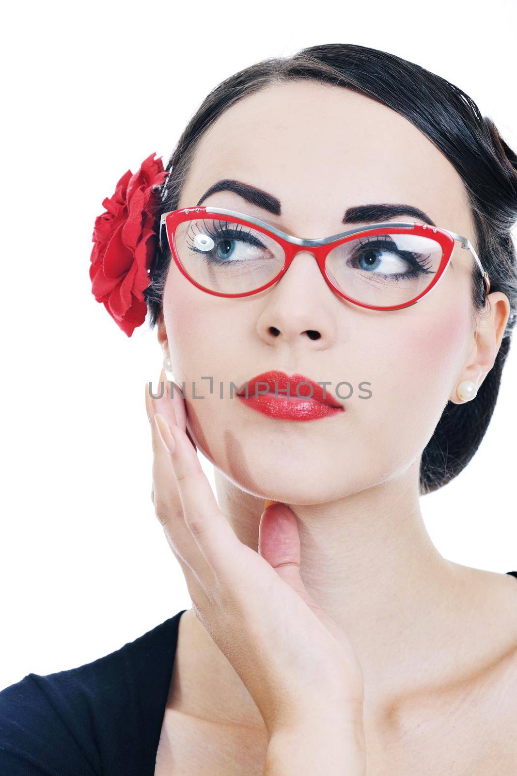 beautiful young woman isolated on white in studio in old fashion clothes representing pinup and retro style