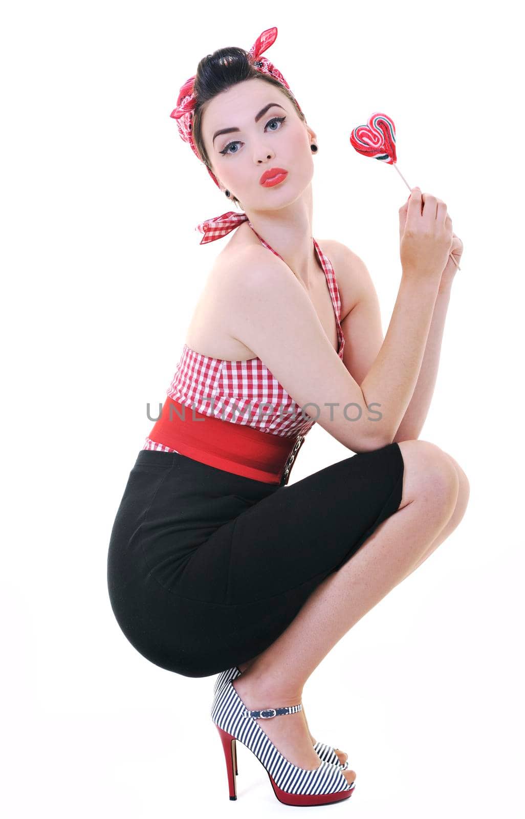 happy young woman with lollipo candy isolated on white 