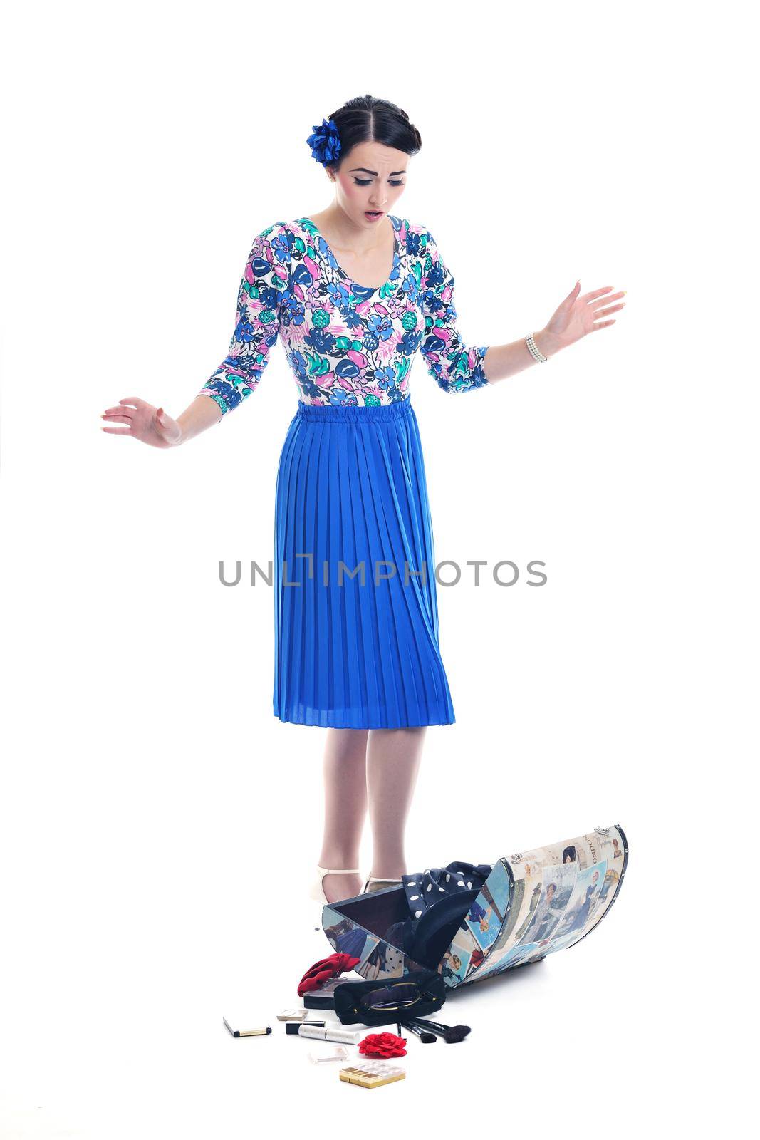 pretty young happy woman with travel bag waiting and posing isolated on white backround  in studio