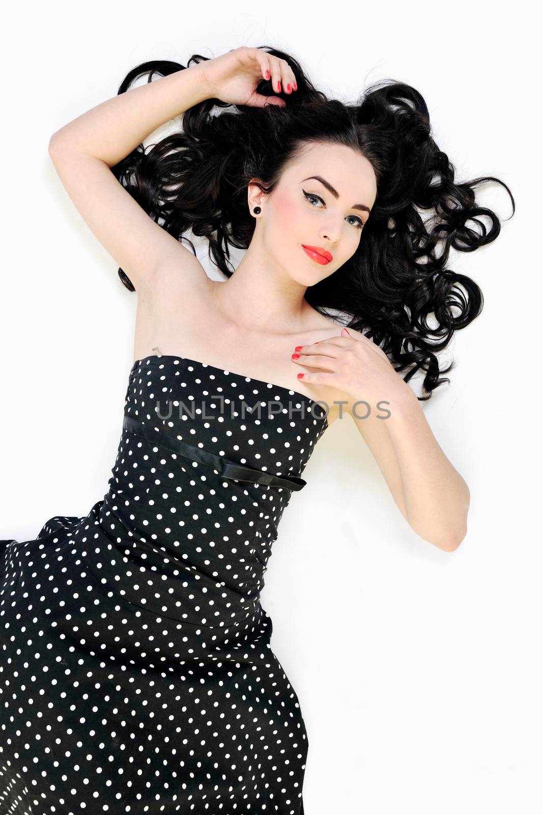 pretty happy young pinup girl isolated on white in studio representing old fashion concept and style
