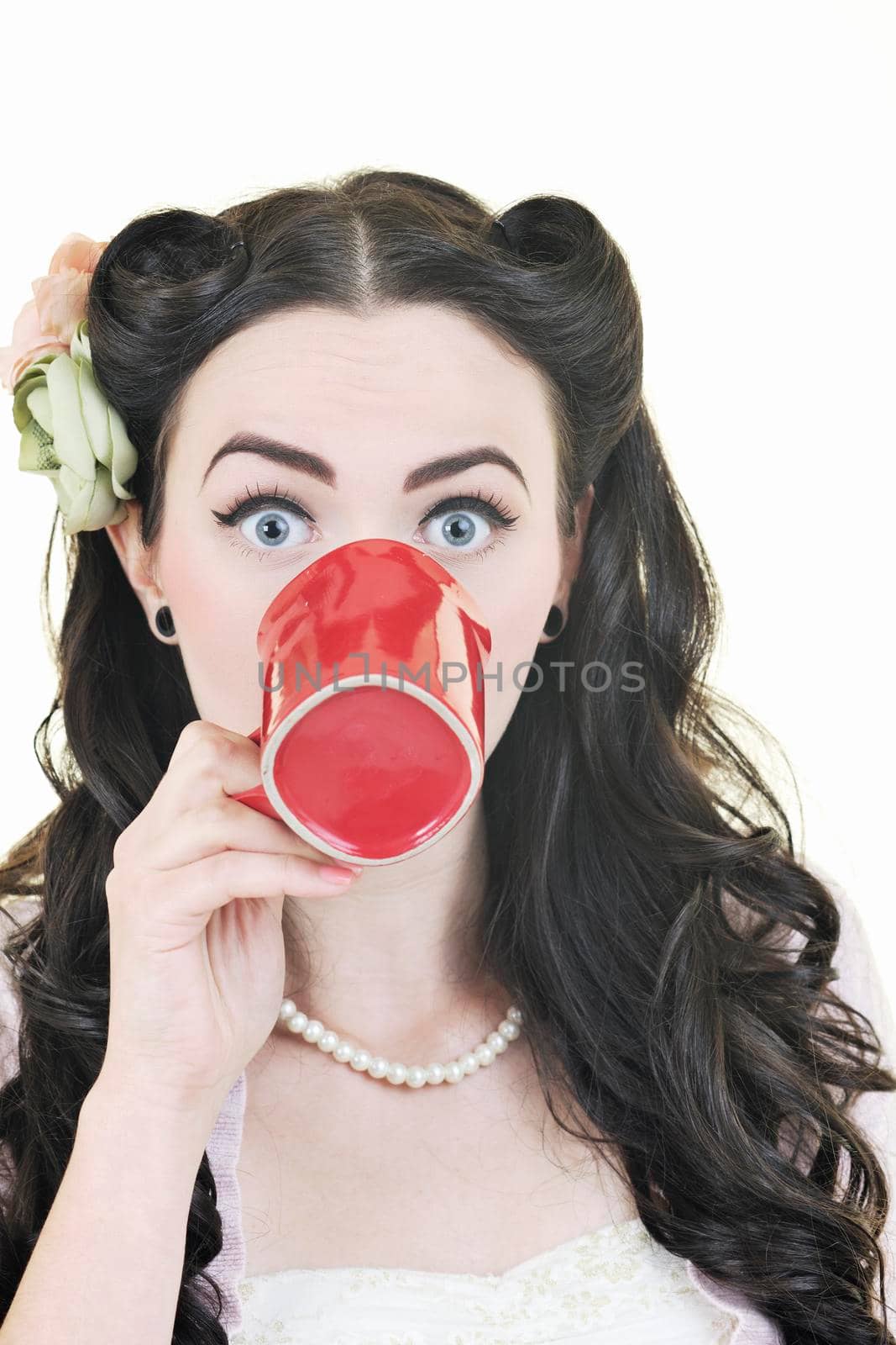 beautiful happy young woman with red coup of coffee isolated on white
