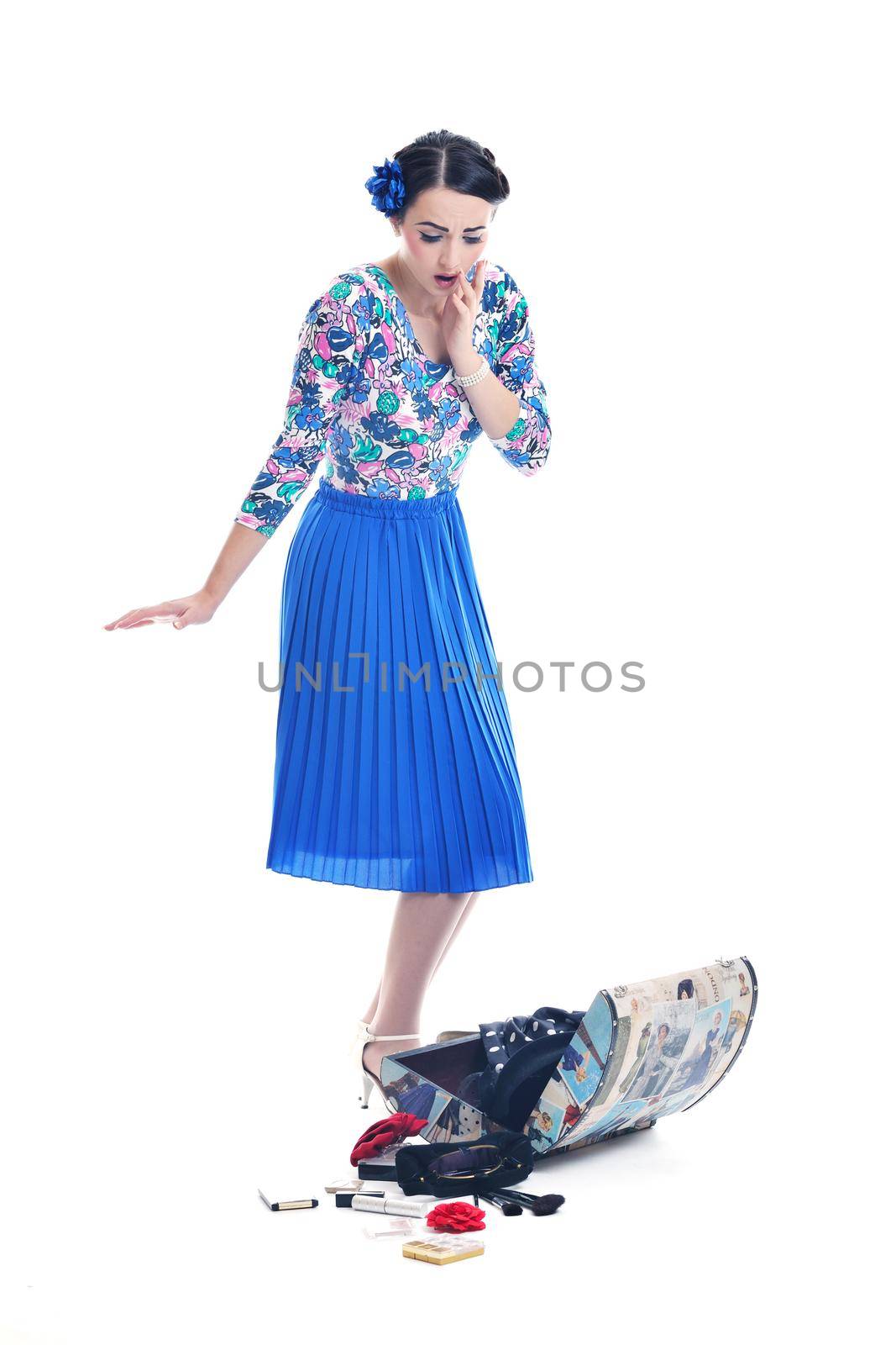 pretty young happy woman with travel bag waiting and posing isolated on white backround  in studio