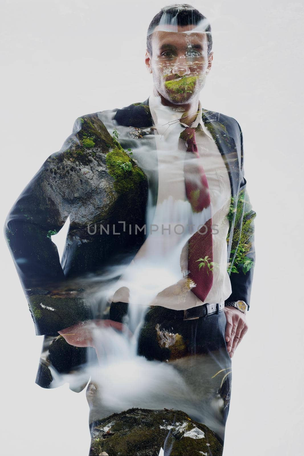 double exposure of business man and creek in forest background by dotshock