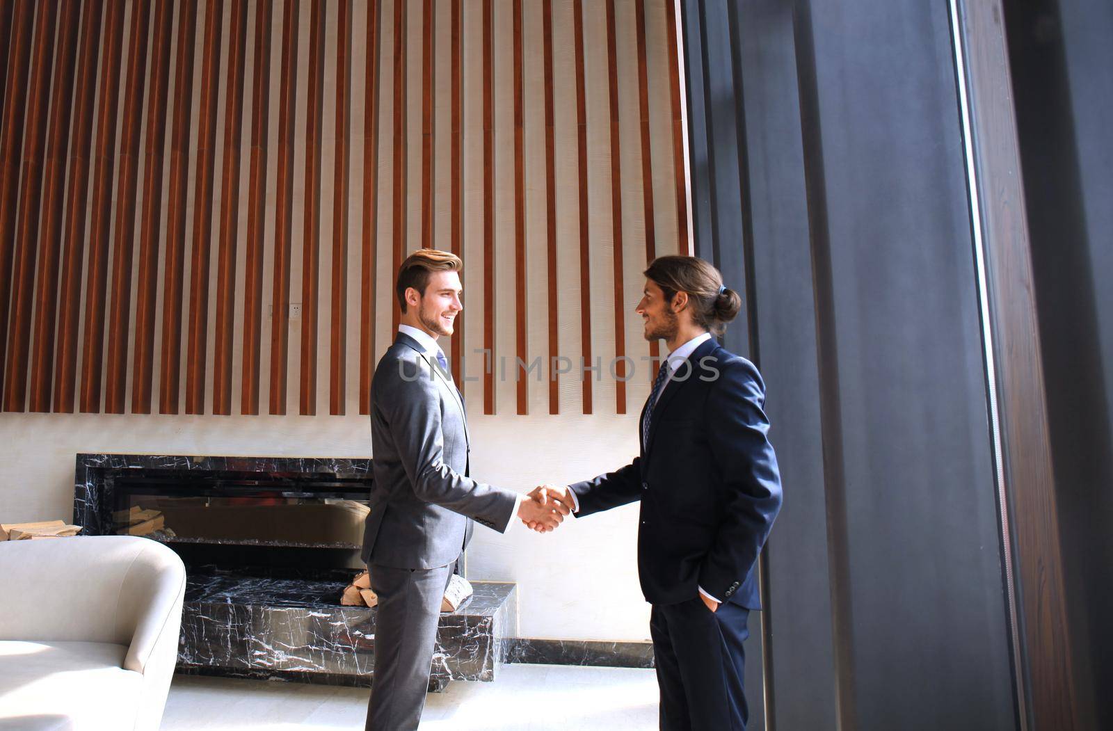 Business people shaking hands, finishing up a meeting