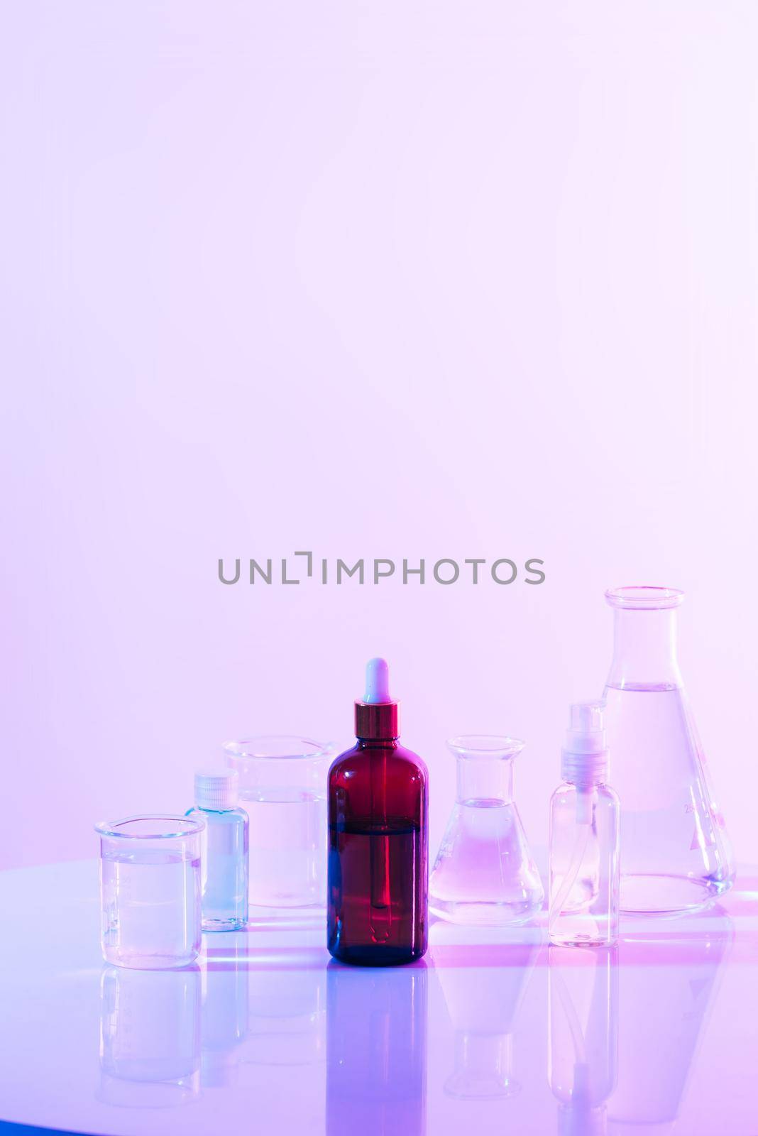 retro brown bottle with flask in science laboratory background  by makidotvn