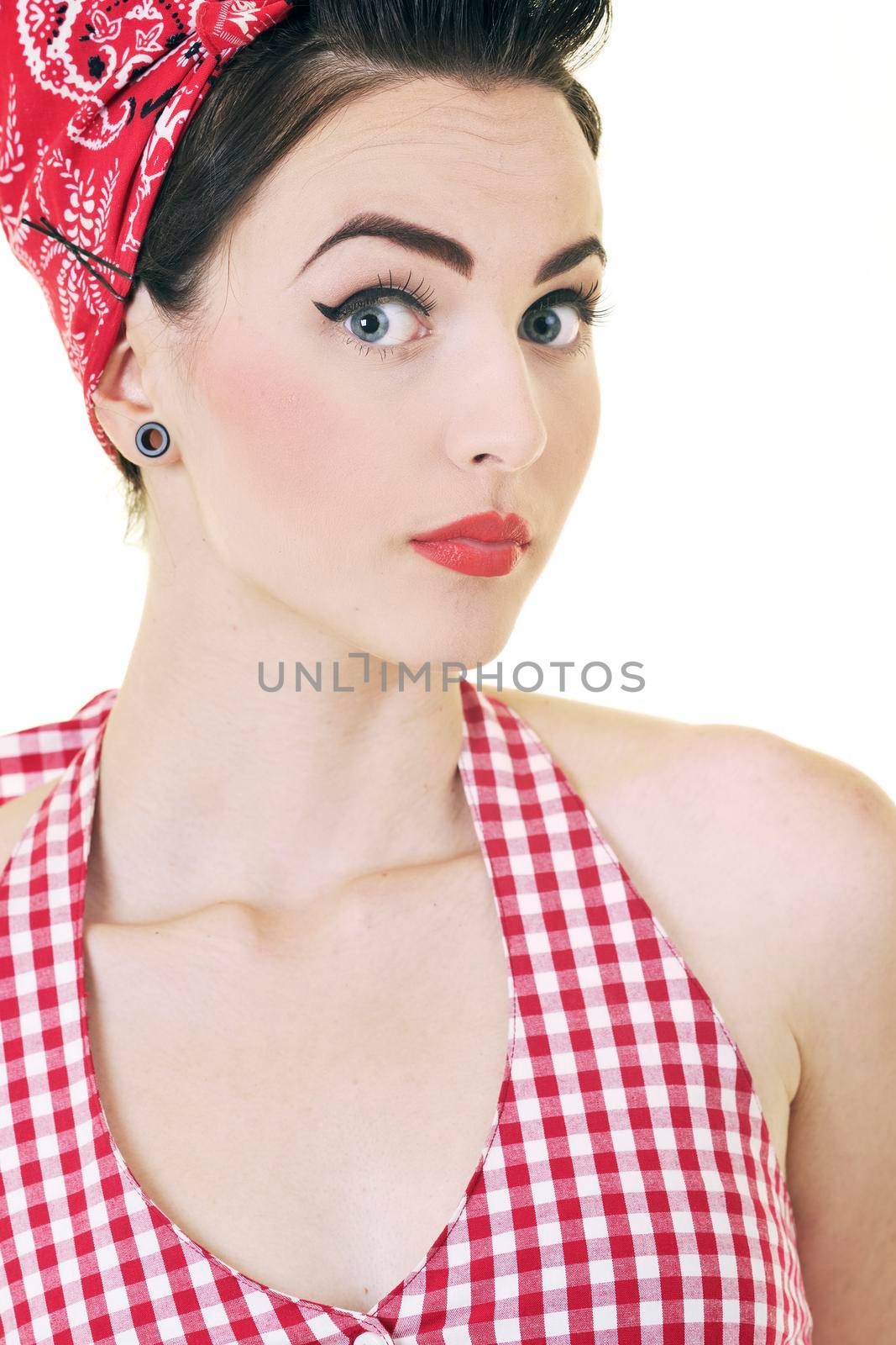 beautiful young woman isolated on white in studio in old fashion clothes representing pinup and retro style