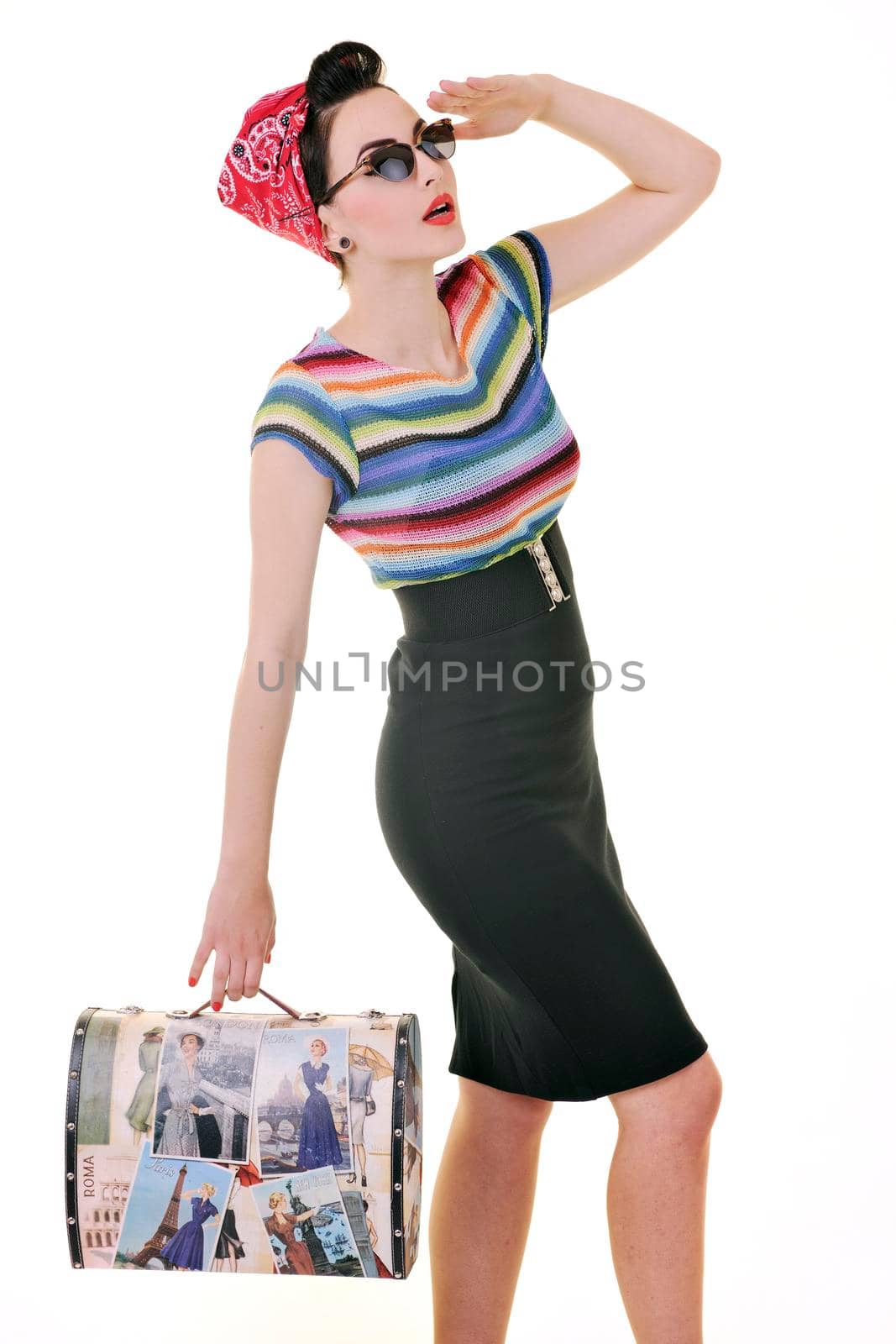 pretty young happy woman with travel bag waiting and posing isolated on white in studio