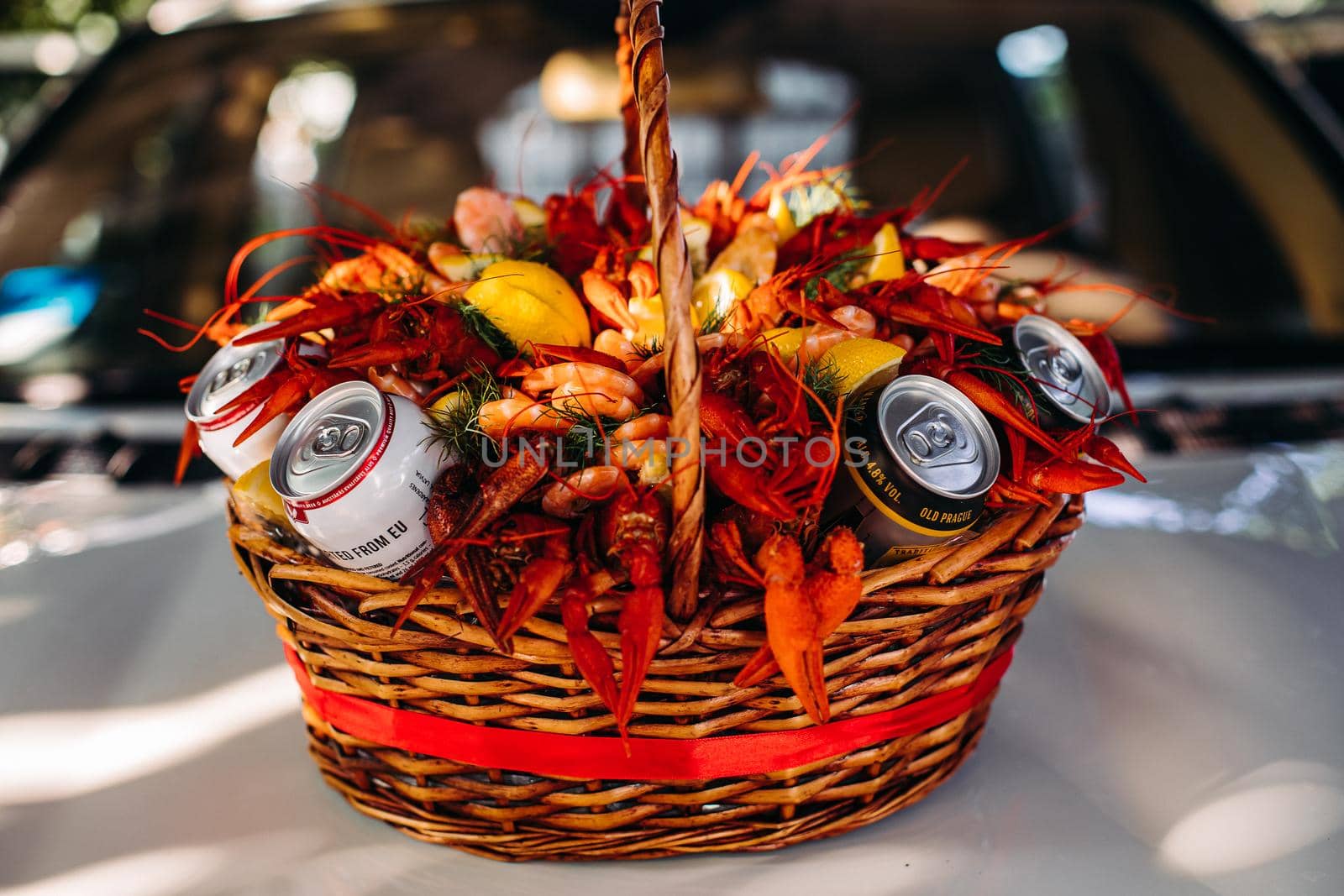 Festive woven gift basket for a man with crayfish and lemons