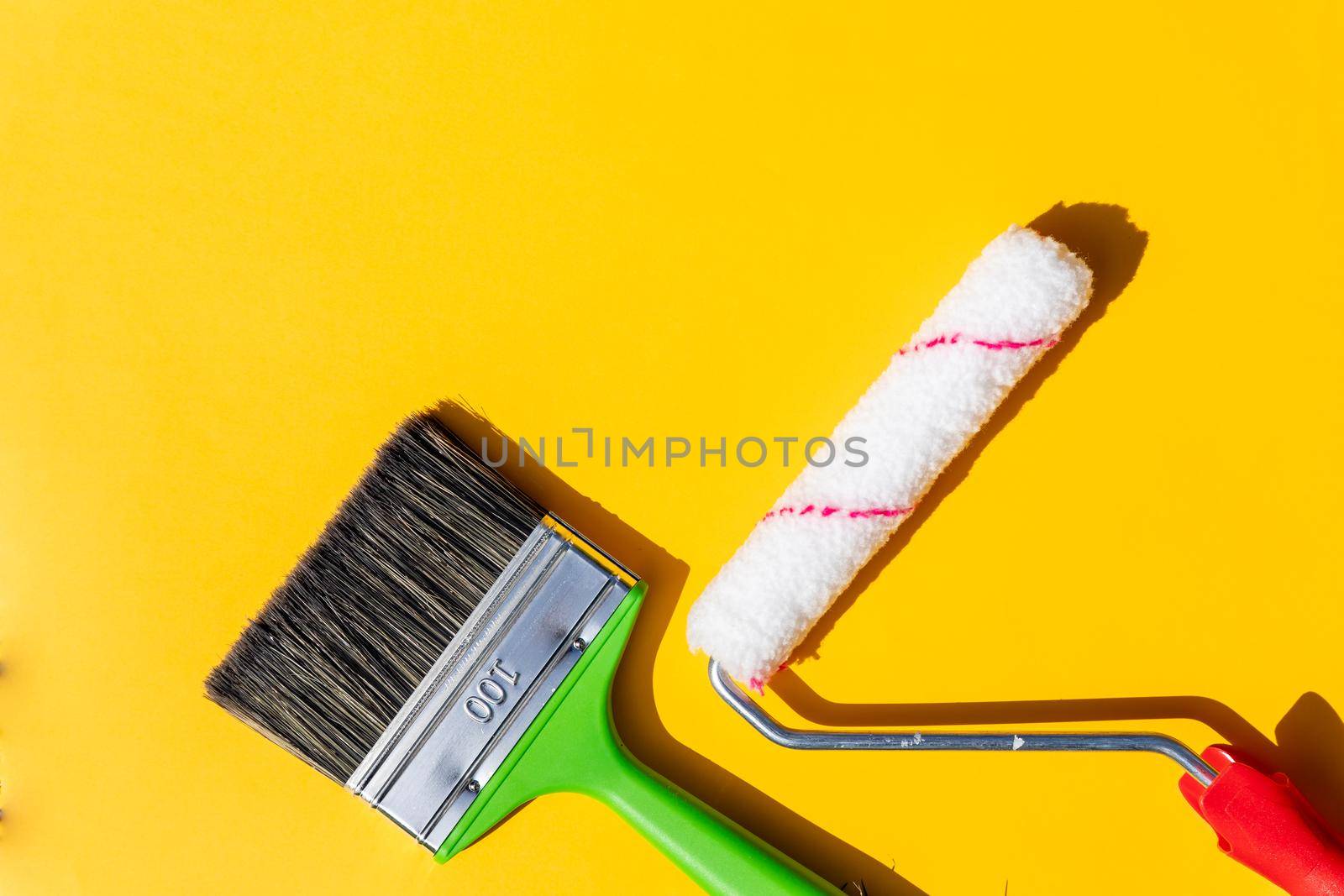 Painting tools. Brushes and roller.