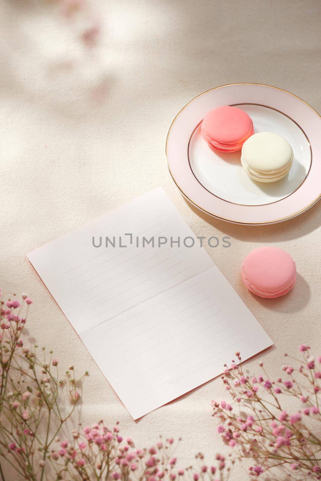 Spring morning concept. Flat-lay of flowers and card over background, top view with space for your text by makidotvn