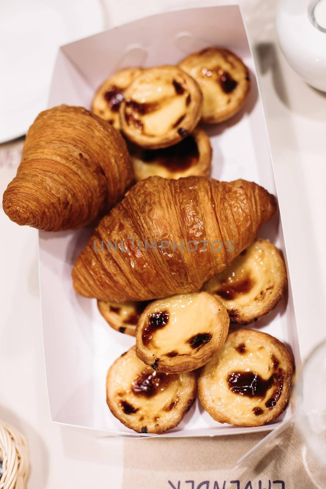 picture of a box with fresh croissant and cookies by StudioLucky