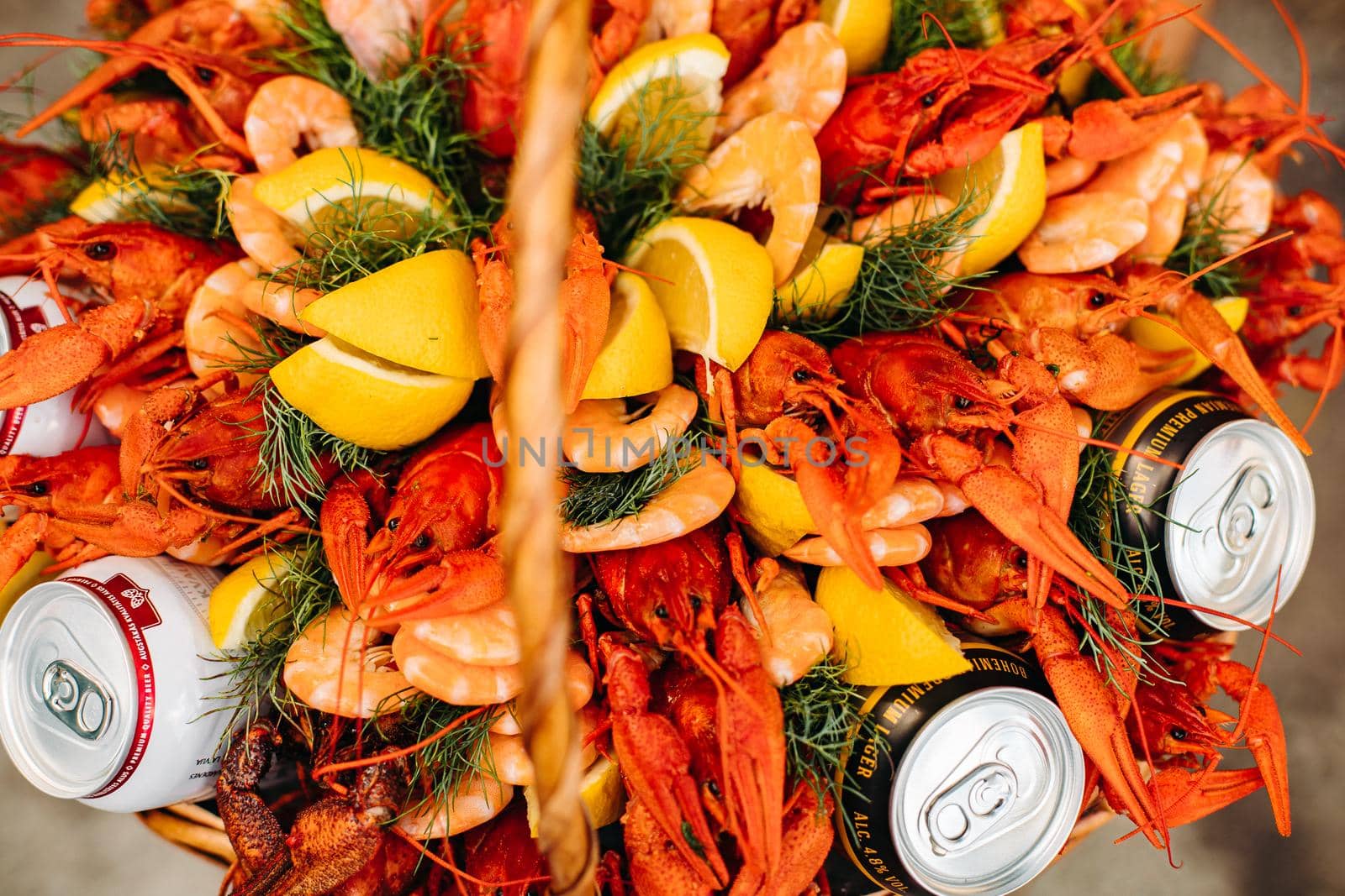 Top view of original edible bouquet with crayfish, dill, lemon, beer for unusual male gift