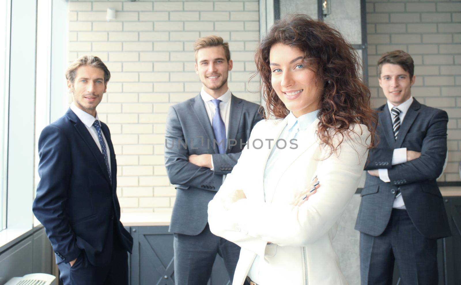 Face of beautiful woman on the background of business people.