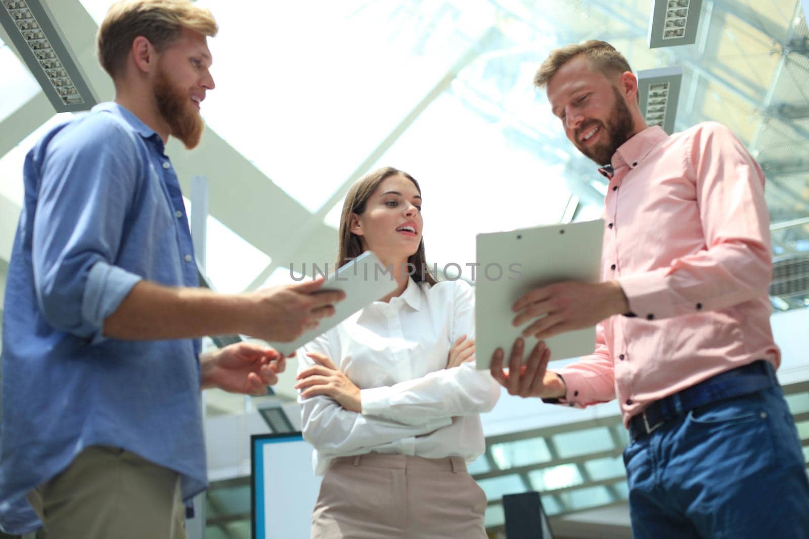 Picture of young designers using tablet in office