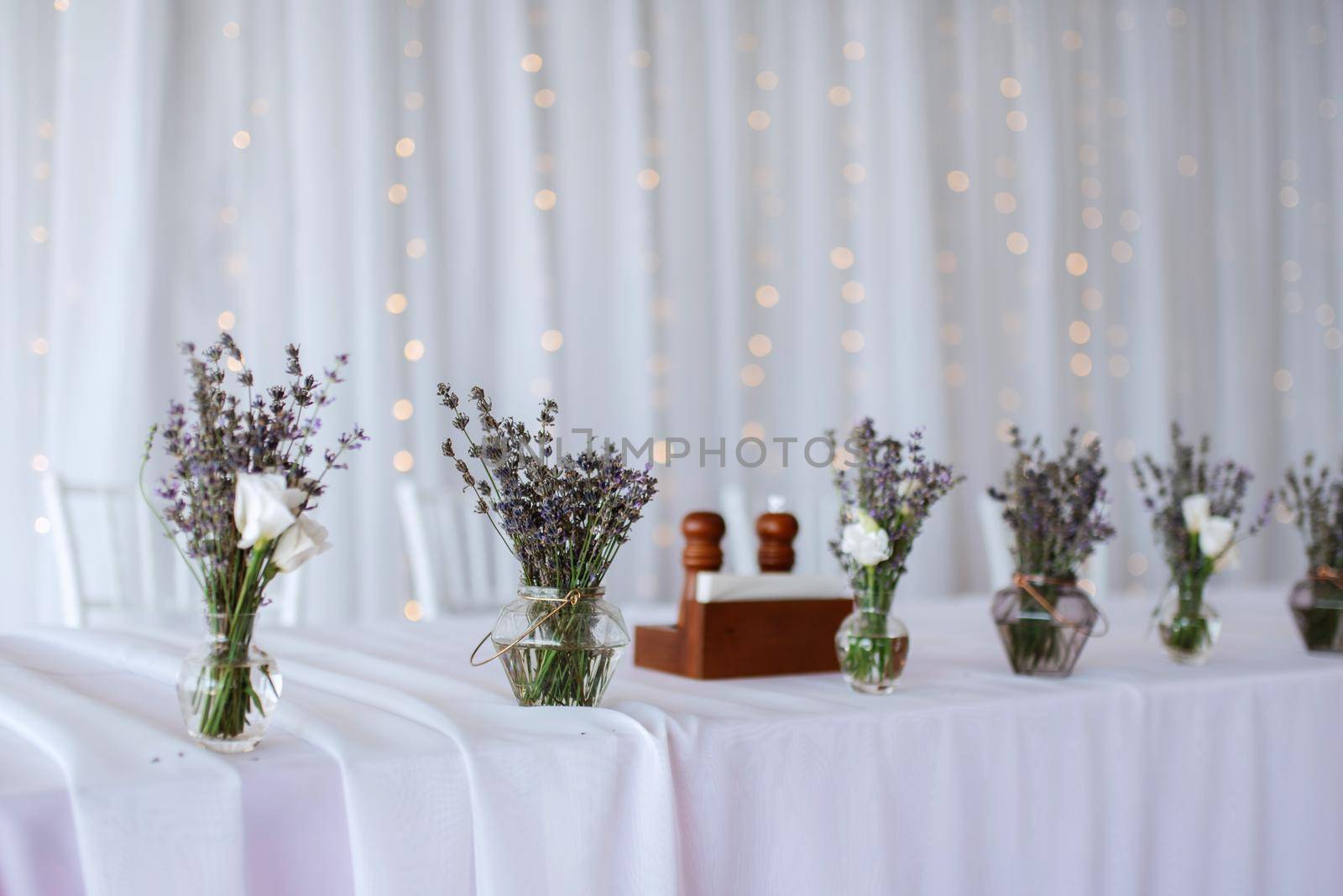 presidium of the newlyweds in the banquet hall of the restaurant by Andreua