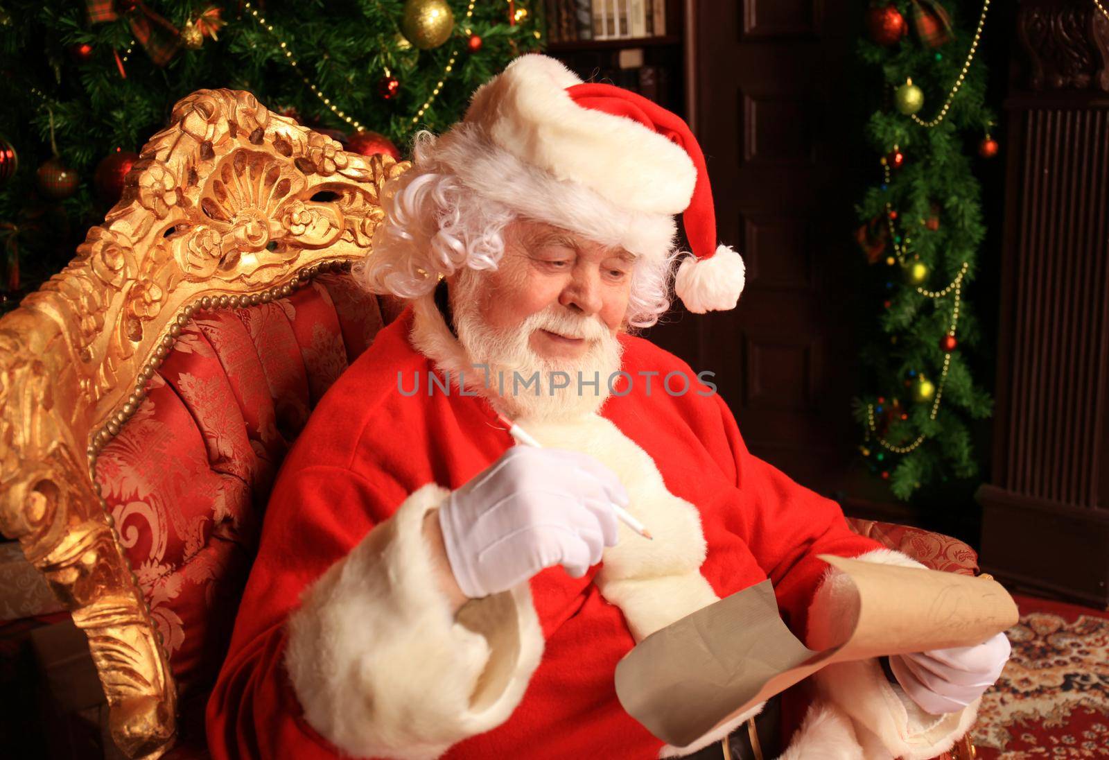Portrait of Santa Claus answering Christmas letters. by tsyhun