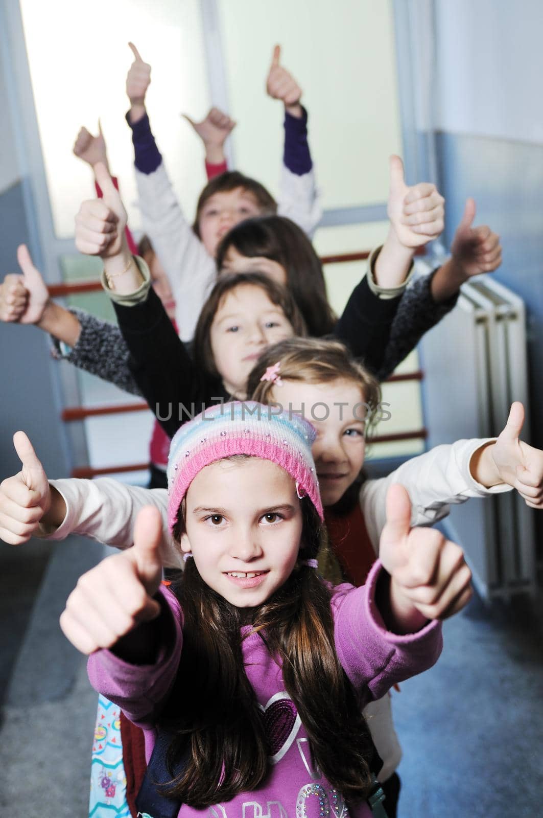 happy children group in school by dotshock