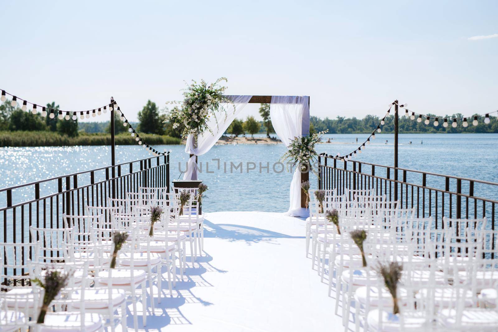 wedding ceremony area, arch chairs decor