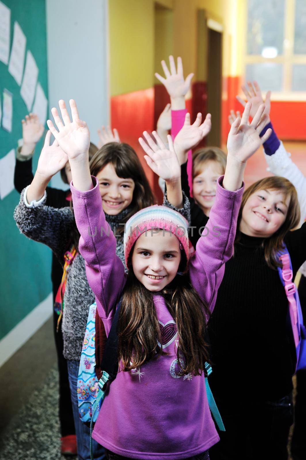 happy children group in school by dotshock