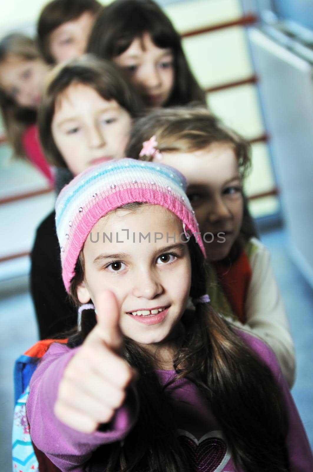 happy children group in school by dotshock