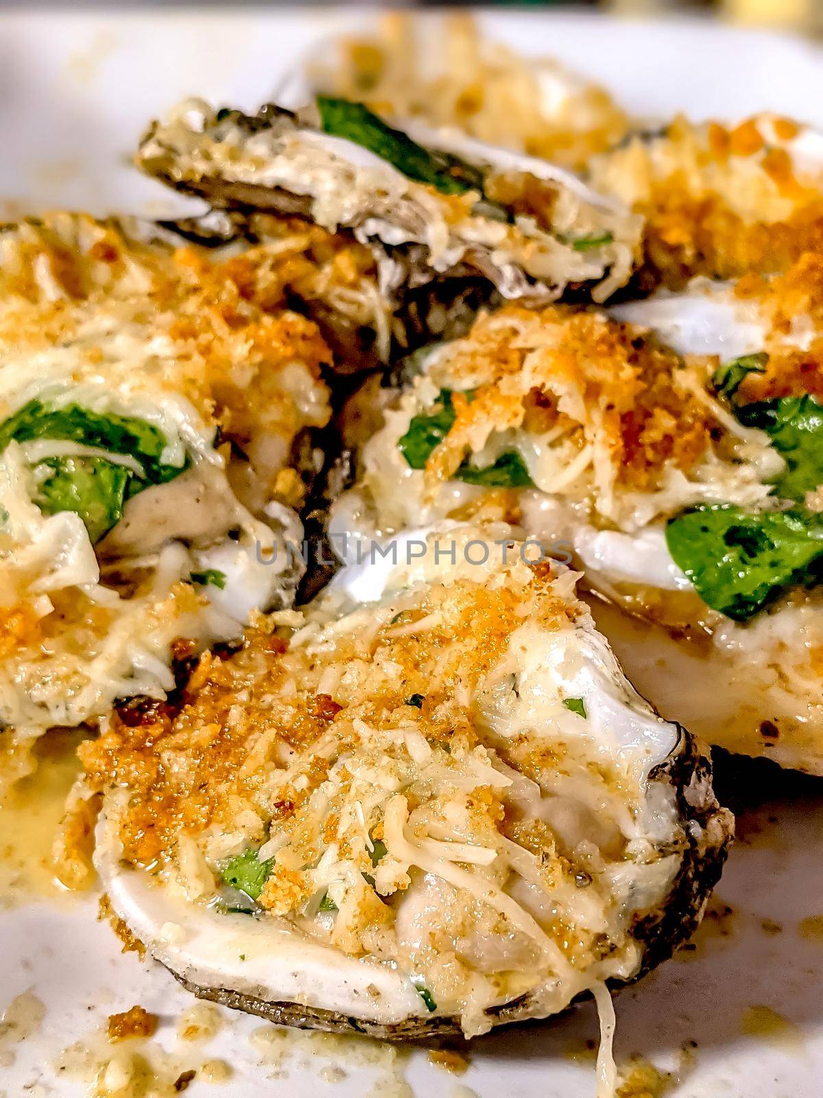 Fried rockerfeller oyster shell with sauce by digidreamgrafix